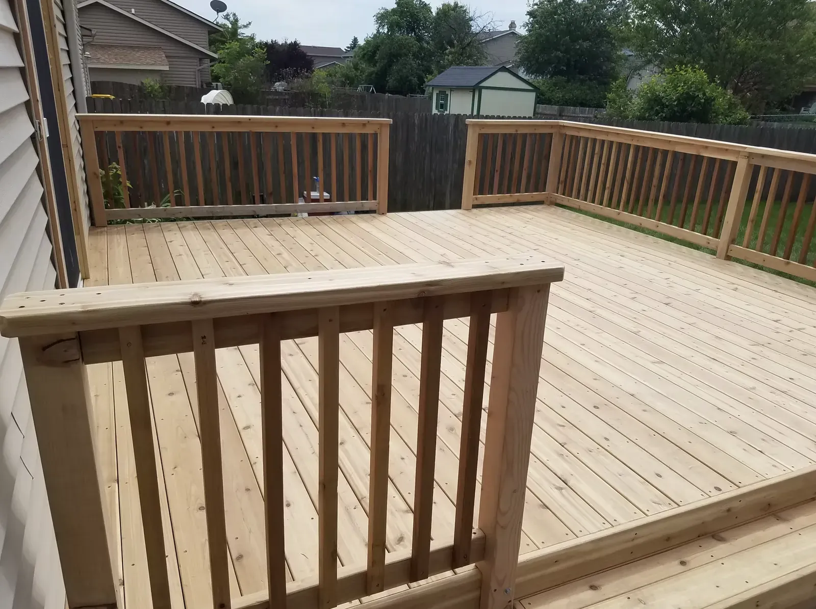 Cedar deck with custom railing corner detail