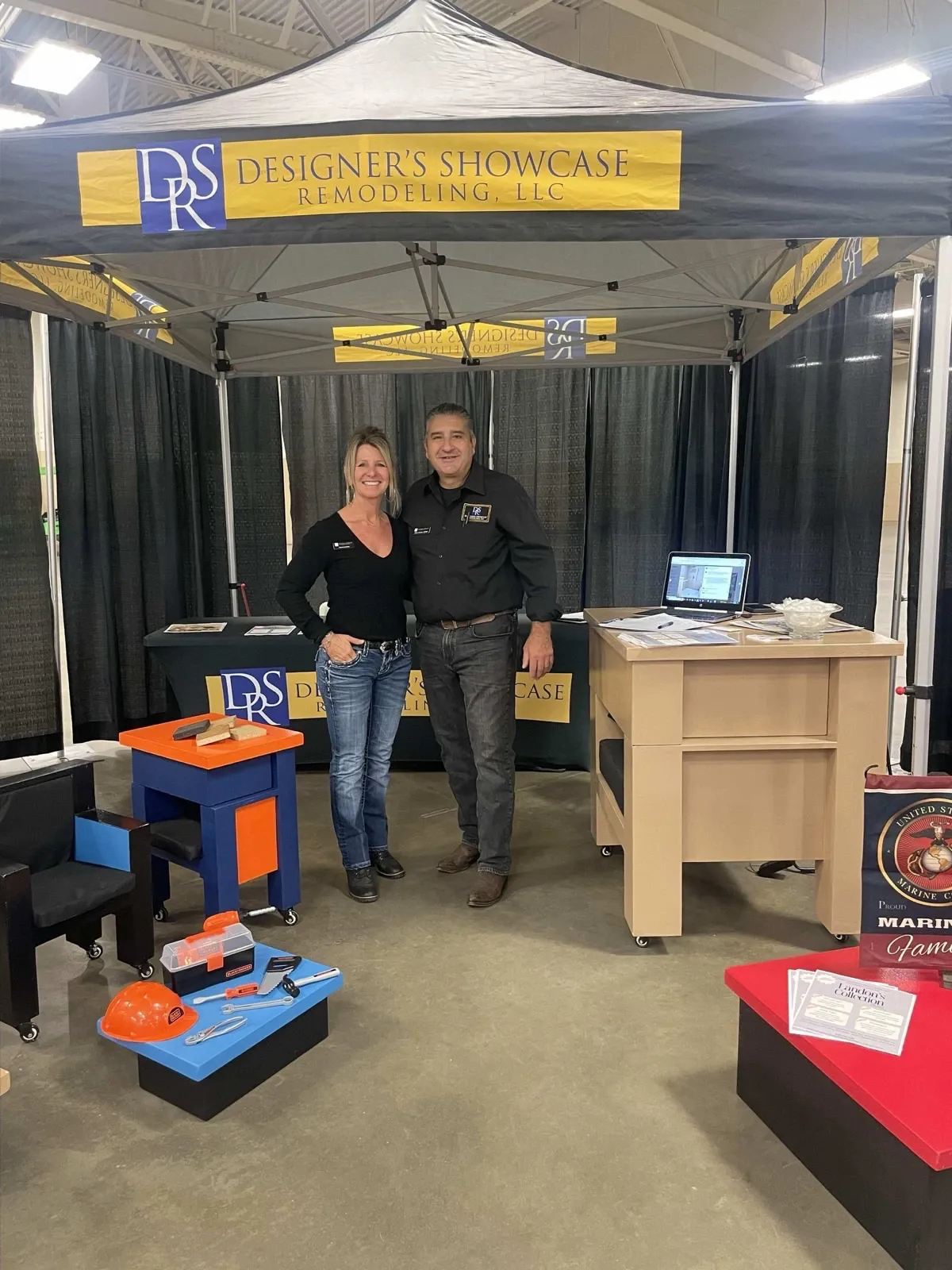 Jeff and Tyanna Cannata representing Designers Showcase Remodeling at a home show