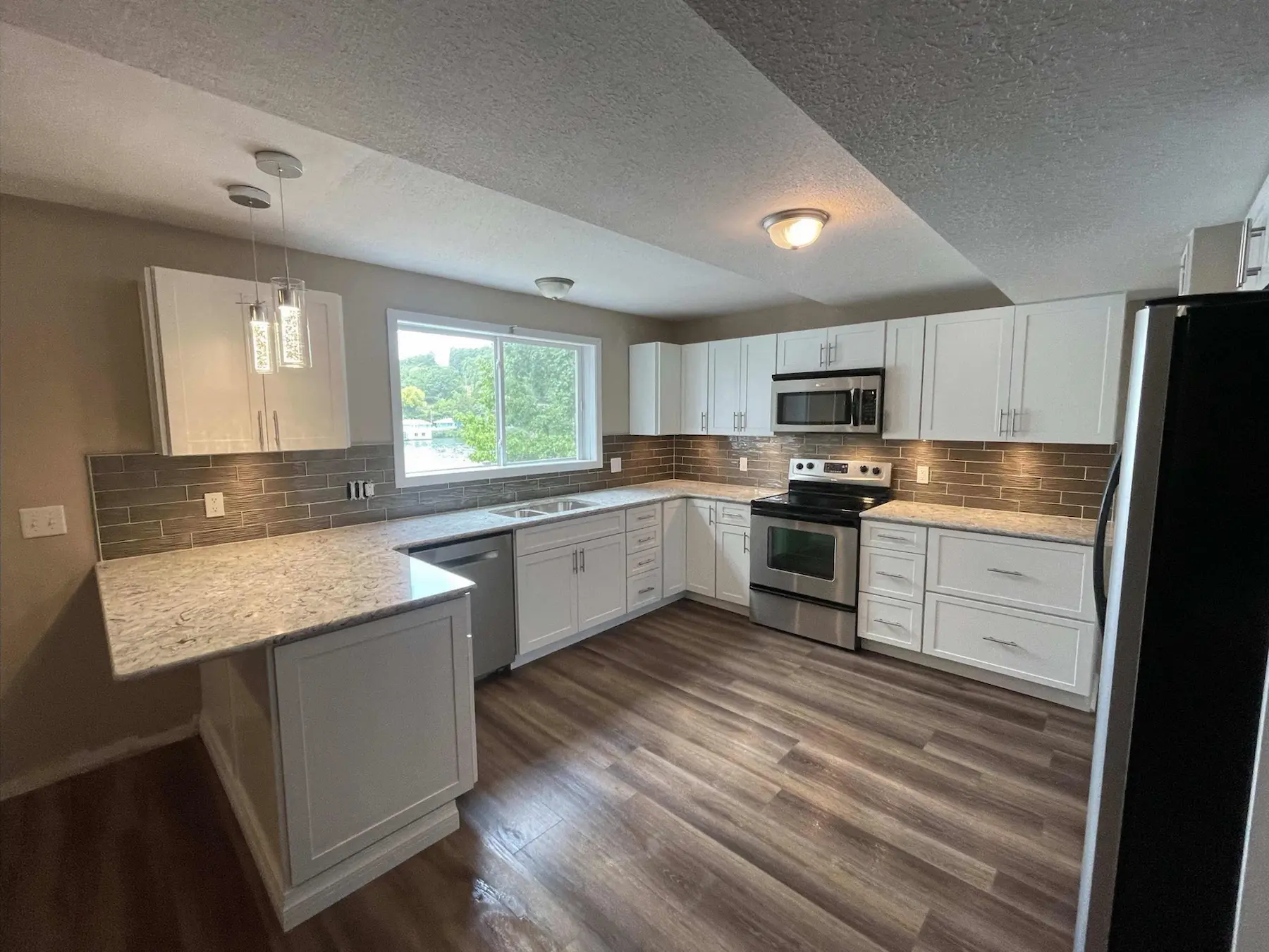 Modern white kitchen remodel hero view