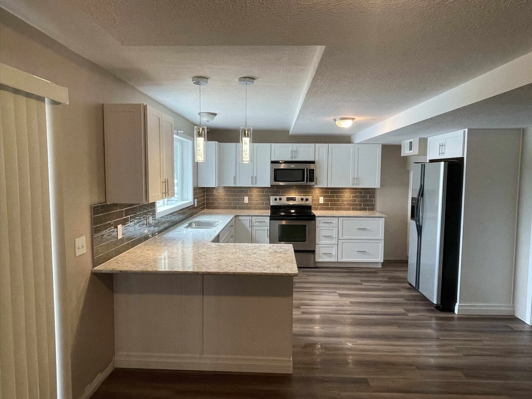 Modern white kitchen side view