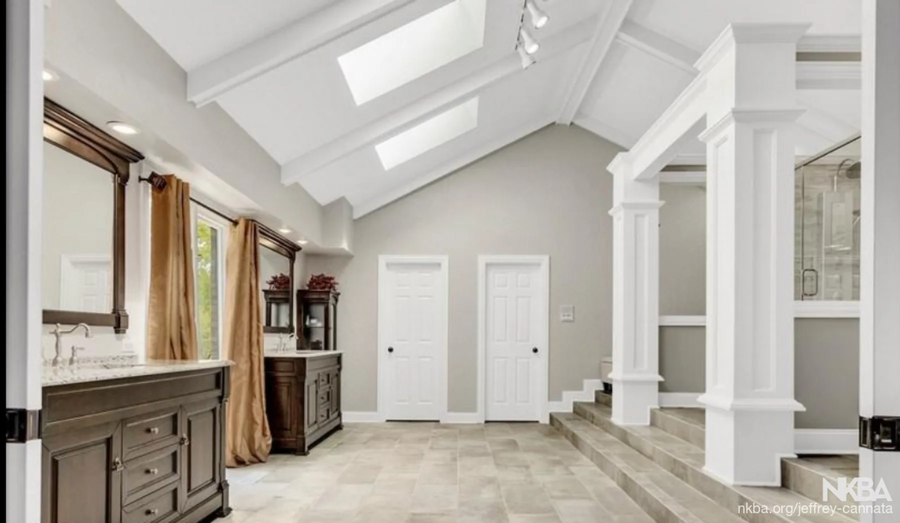 Luxury master bathroom remodel with vaulted ceiling